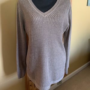 Large sweater, great color and staple piece.